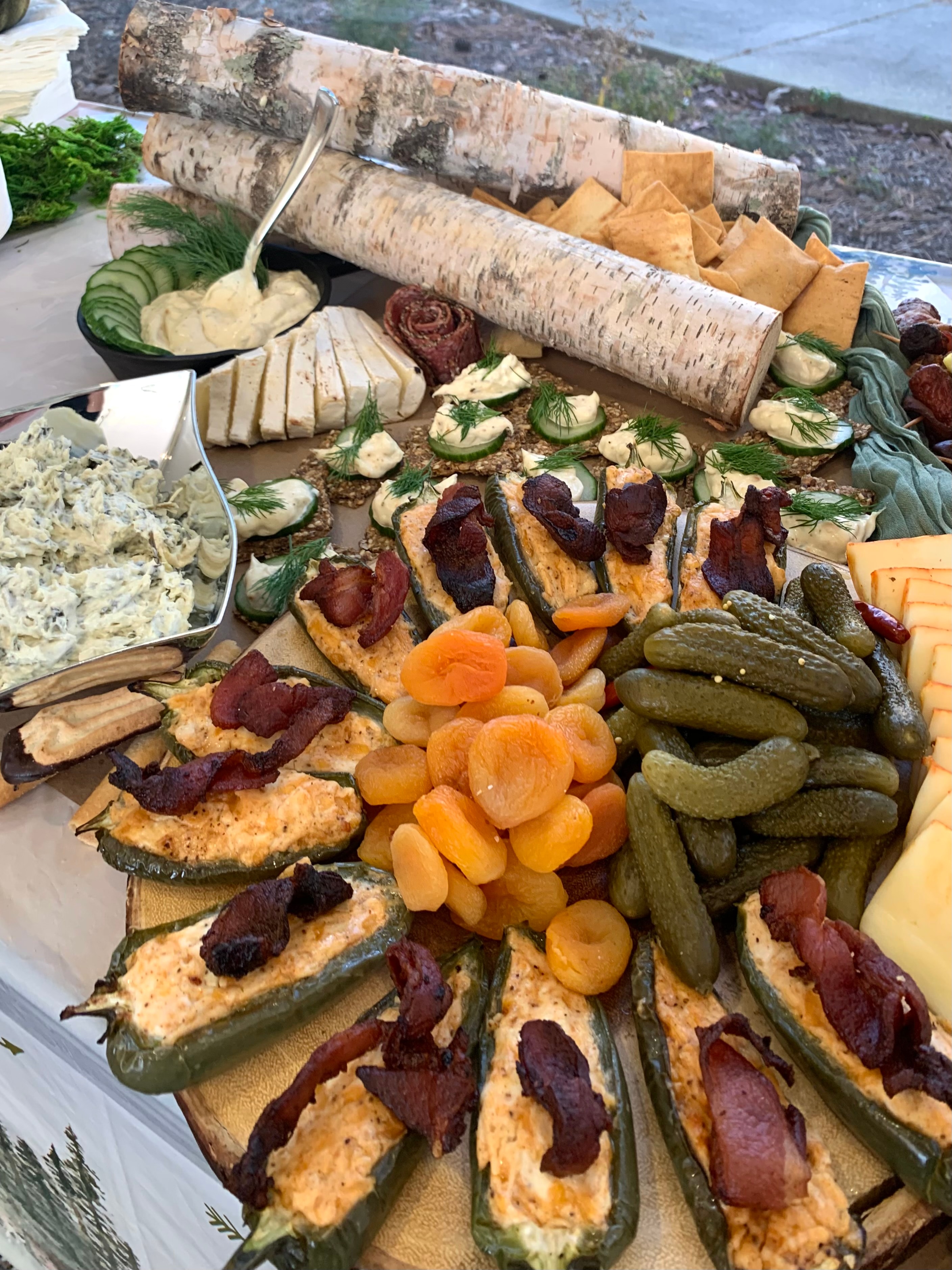 Jalapeño popper and birch log charcuterie board